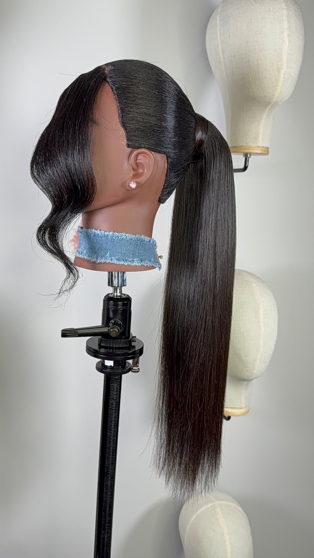 Close-up of Velvet Flow tie ponytail with sleek human hair.