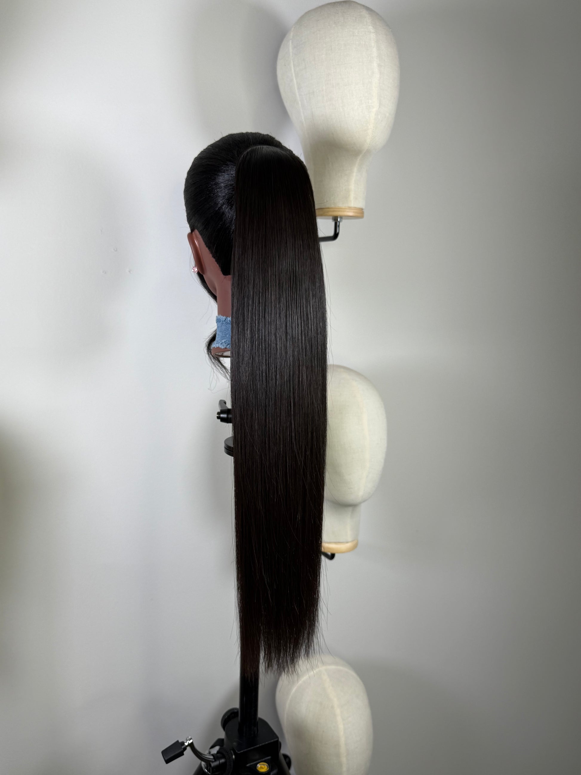 Velvet Flow tie ponytail styled for a polished, elegant finish.