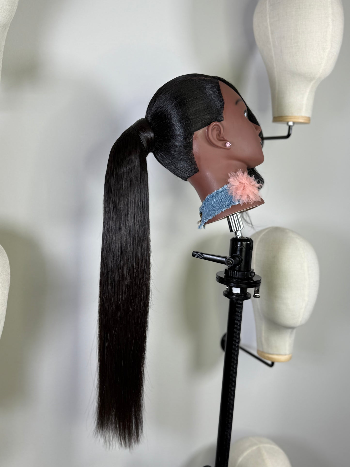 Velvet Flow tie ponytail styled for a polished, elegant finish.