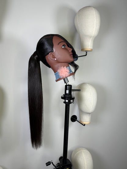 Close-up of Velvet Flow tie ponytail with sleek human hair.