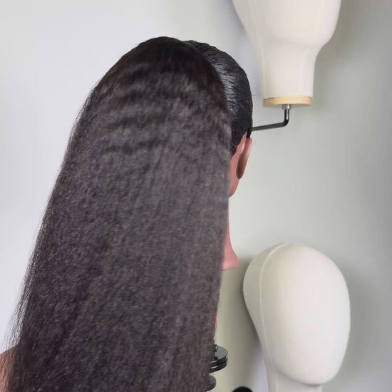 Close-up of sleek drawstring ponytail with silk press texture